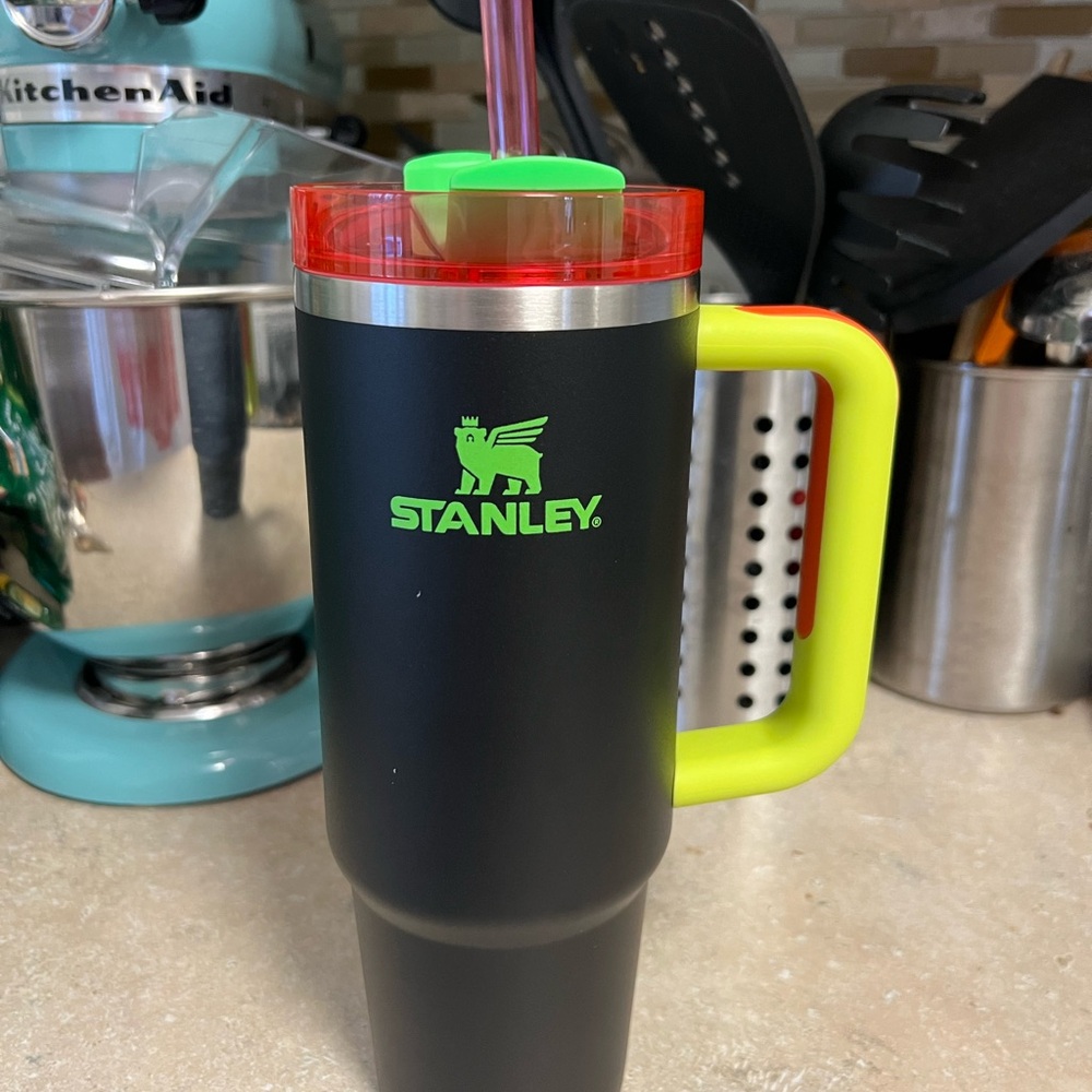 Stanley Black Tumbler with Bright Yellow Handle and Red Lid